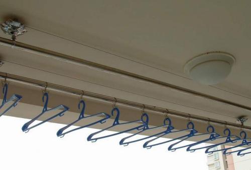 晾衣架安装 阳台固定单杆晾衣架安装方法